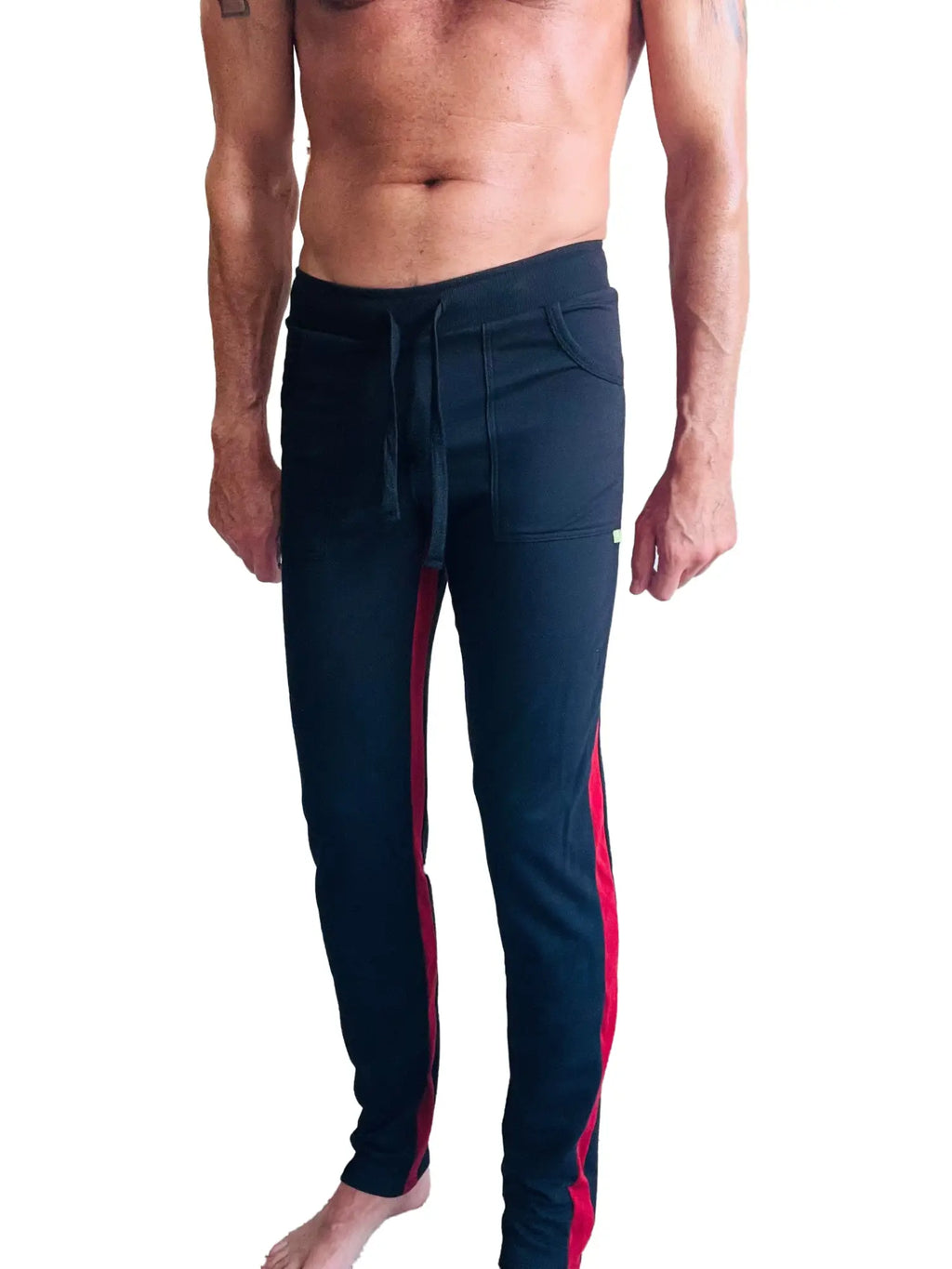 Black eco-track and yoga sweat pant with bold cinnabar side stripes and drawstring waistband for athletic wear