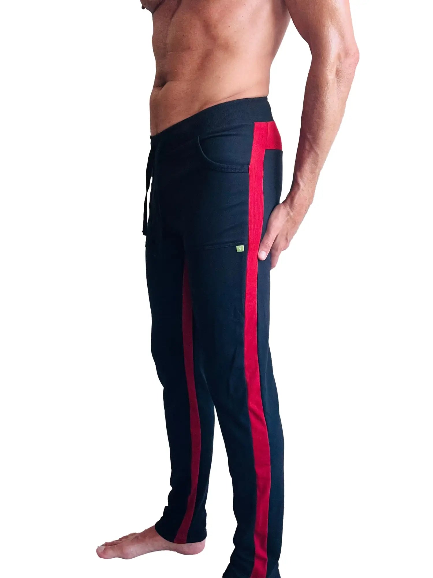 Black eco-track and yoga sweat pant with bold cinnabar red side stripes and drawstring waistband for comfort