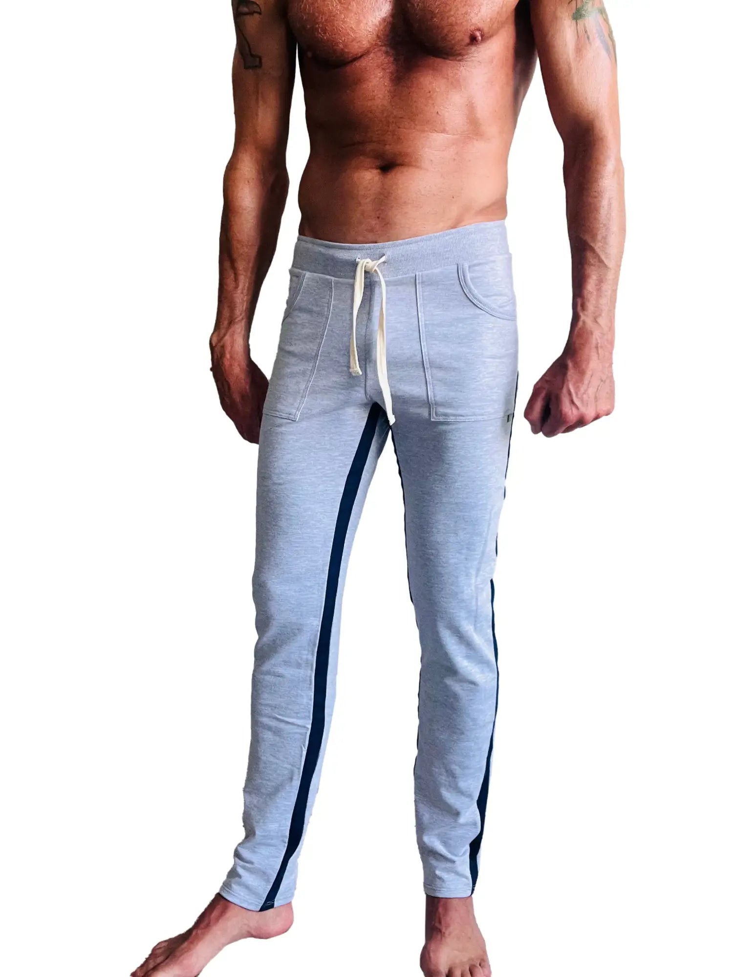 Light gray eco-track and yoga sweat pant with navy blue side stripes and white drawstring waistband in heather grey