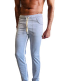 Eco-track and yoga sweat pant in heather grey with white side stripes and cream-colored drawstring joggers