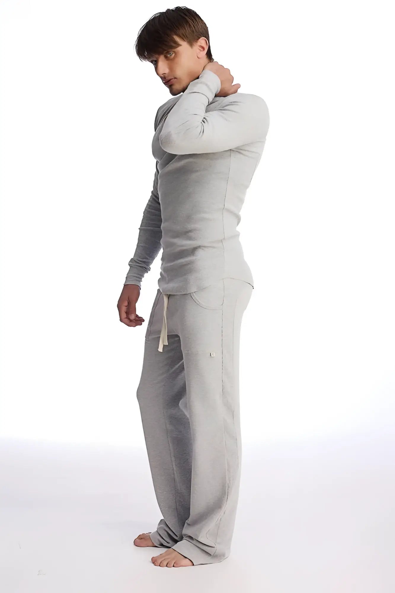 Gray eco-track and yoga sweat pant set with long sleeves and relaxed fit made of soft fabric in solid heather grey