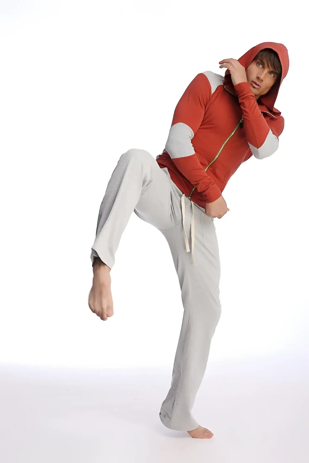 Red and gray zip-up hoodie with white sleeve panels paired with solid heather grey eco-track and yoga sweat pant