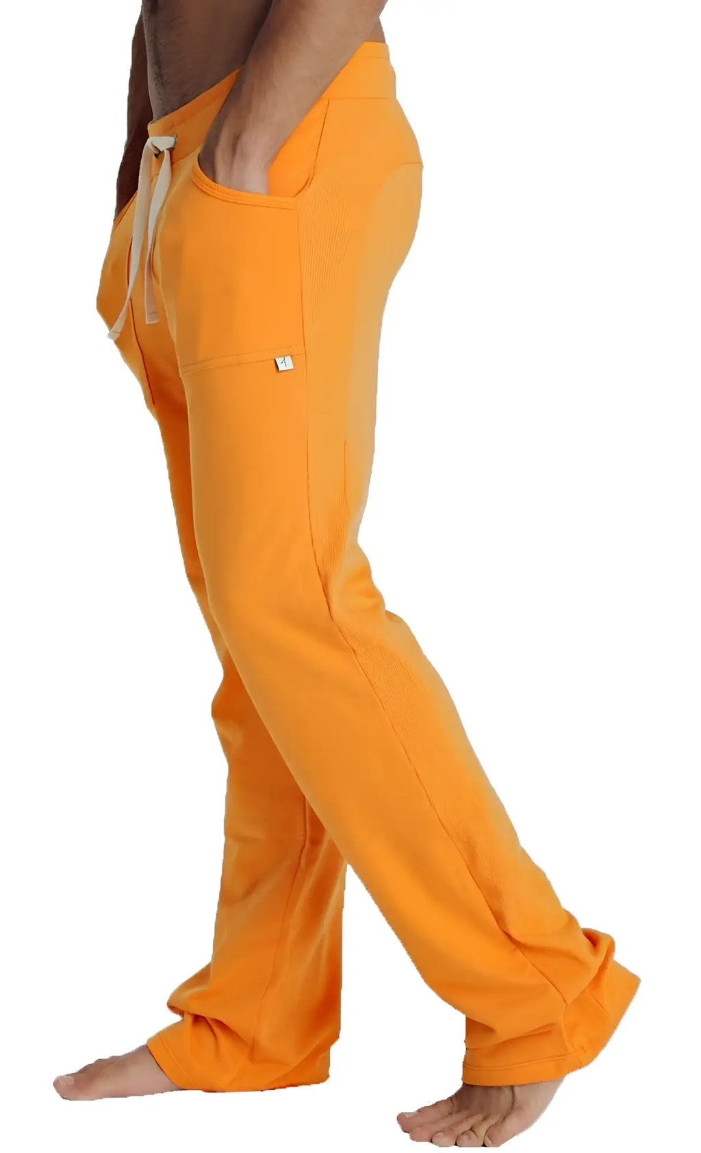 Orange eco-track and yoga sweat pants with drawstring waist and side pockets designed for comfort and flexibility
