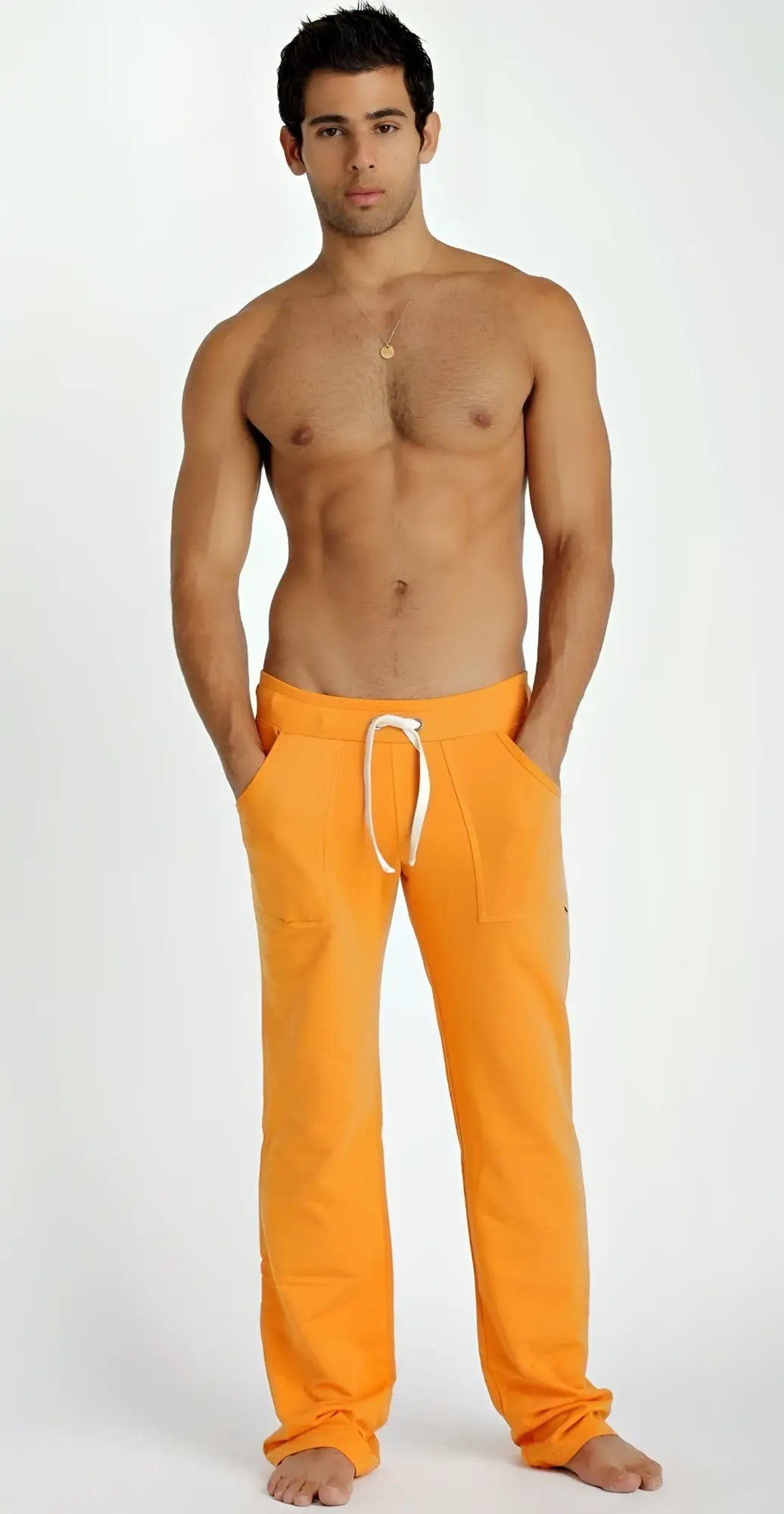 Eco-track and yoga sweat pant in sun orange with white drawstring waistband made from eco-friendly fabric