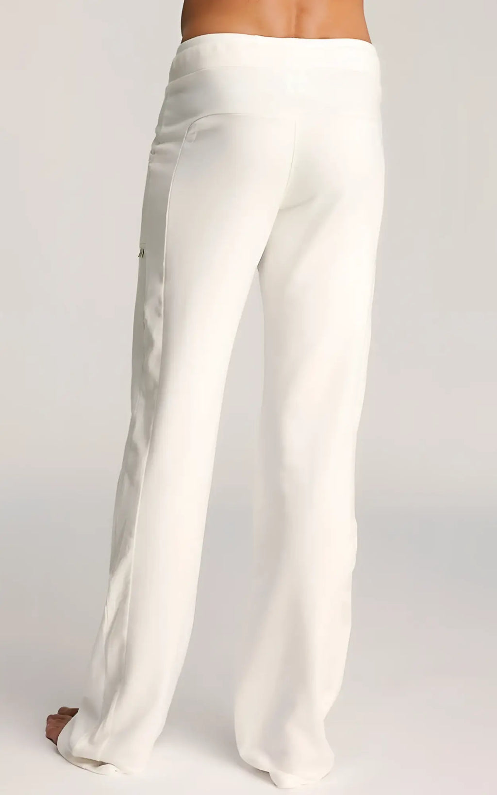 White eco-track and yoga sweat pant with flowing wide-leg design smooth fabric and subtle side seam details
