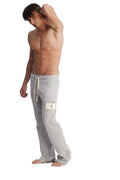 Edge eco-track and yoga sweat pant in heather grey with white drawstrings and a small patch on the left thigh