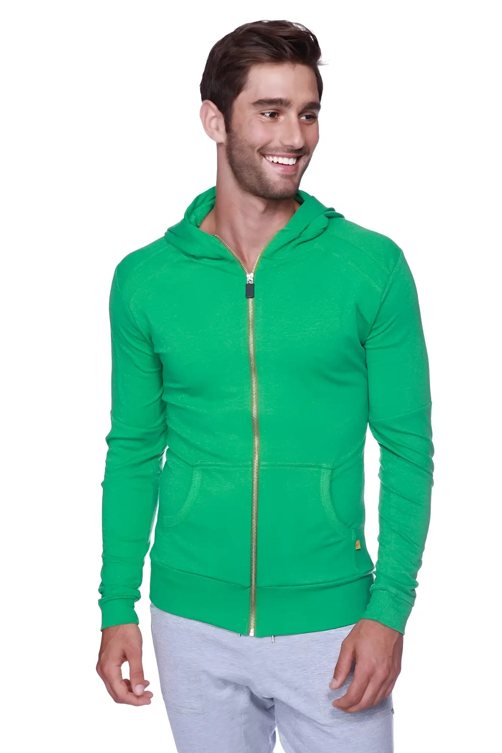 Edge form-fit crossover yoga track performance hoodie in bamboo green with gold zipper and front pockets