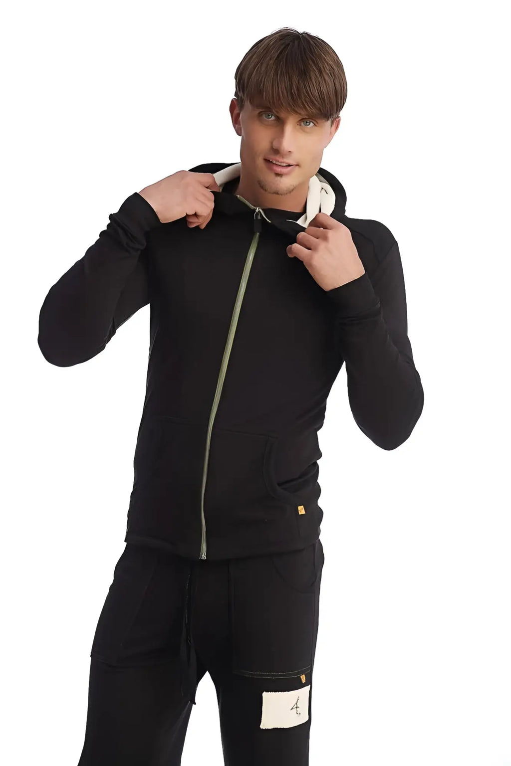 Edge form-fit crossover yoga track performance hoodie in black with light green zipper and white inner lining