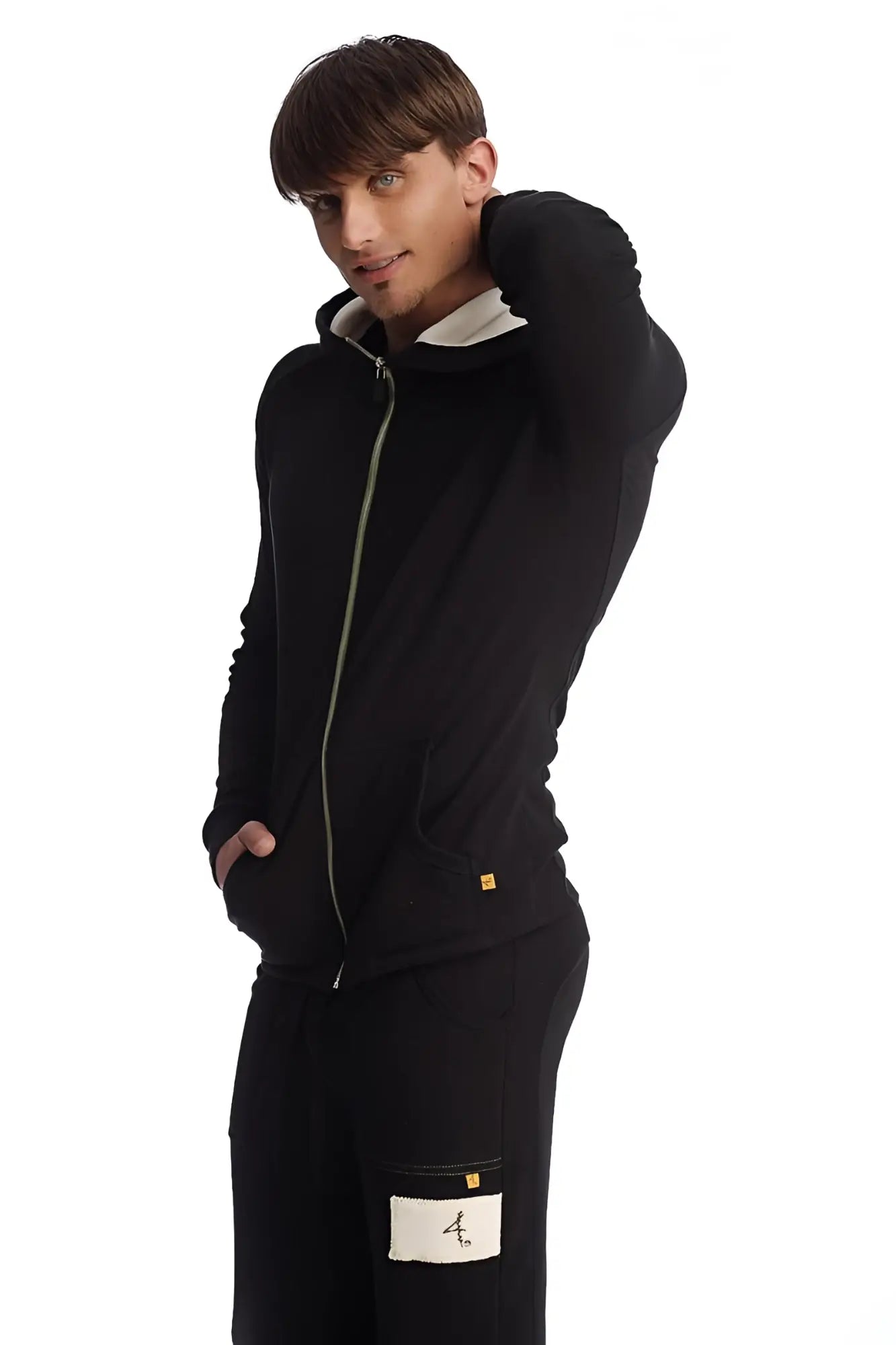 Edge form-fit crossover yoga track performance hoodie in black with light green zipper and white inner lining