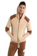 Edge form-fit crossover yoga track performance hoodie in beige and brown with contrasting green zipper for workouts