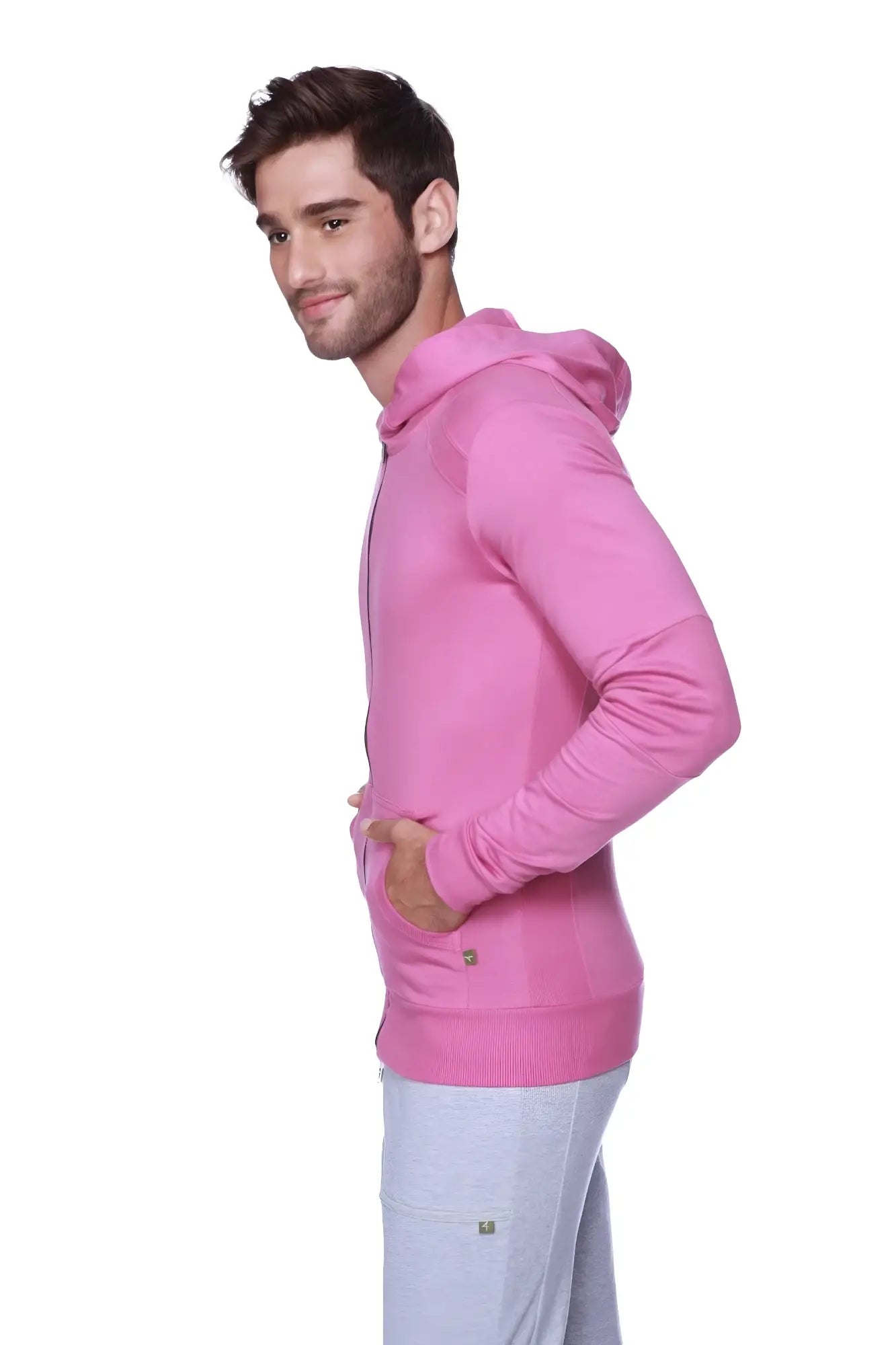 A vibrant berry pink long-sleeved form-fit crossover yoga track performance hoodie with drawstring hood and front pockets