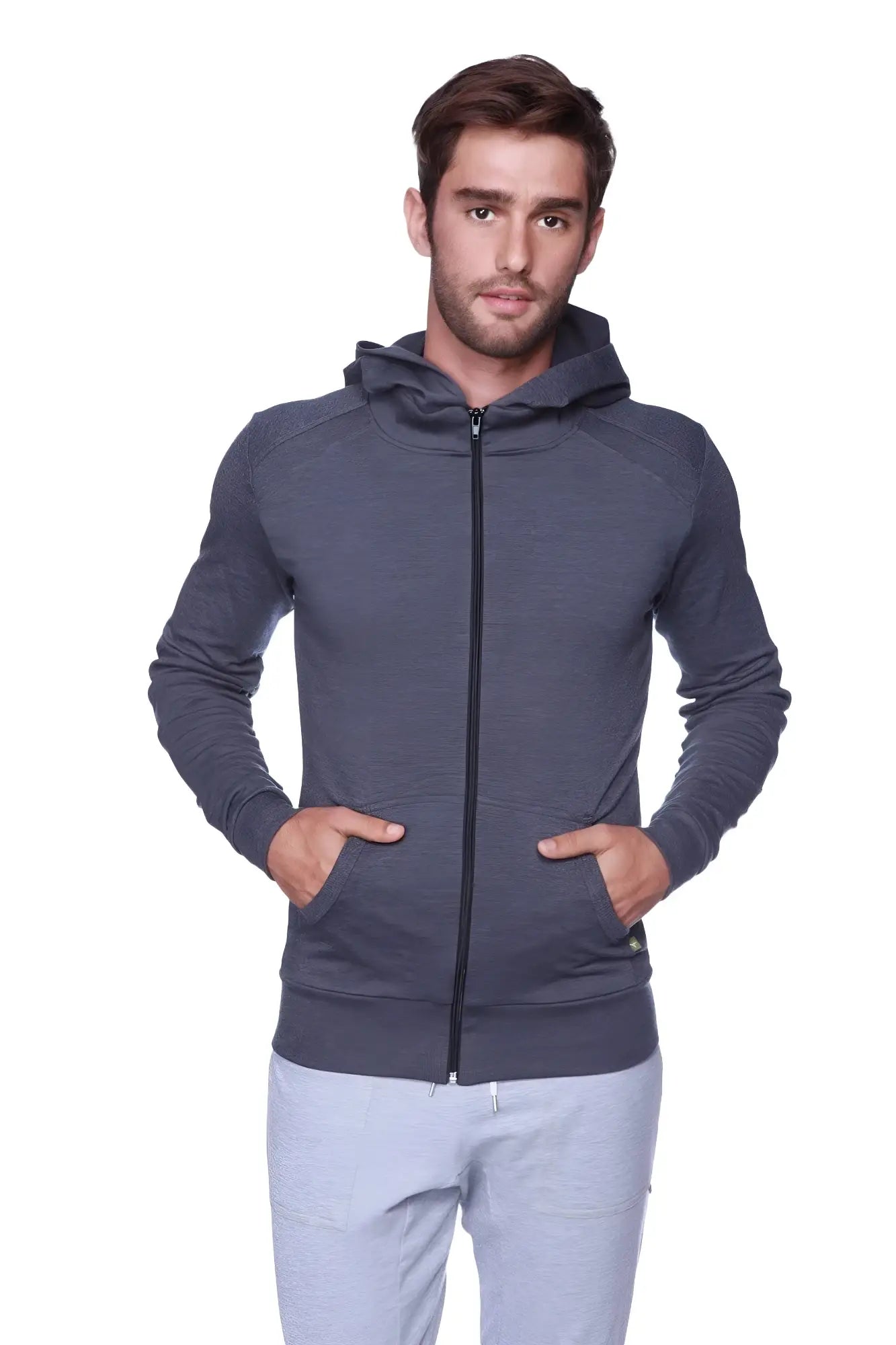 Dark gray form-fit crossover yoga track performance hoodie with textured fabric and black zipper in charcoal color