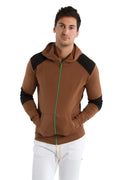 Form-fit crossover yoga track performance hoodie in chocolate and black with green zipper pull and zip-up front