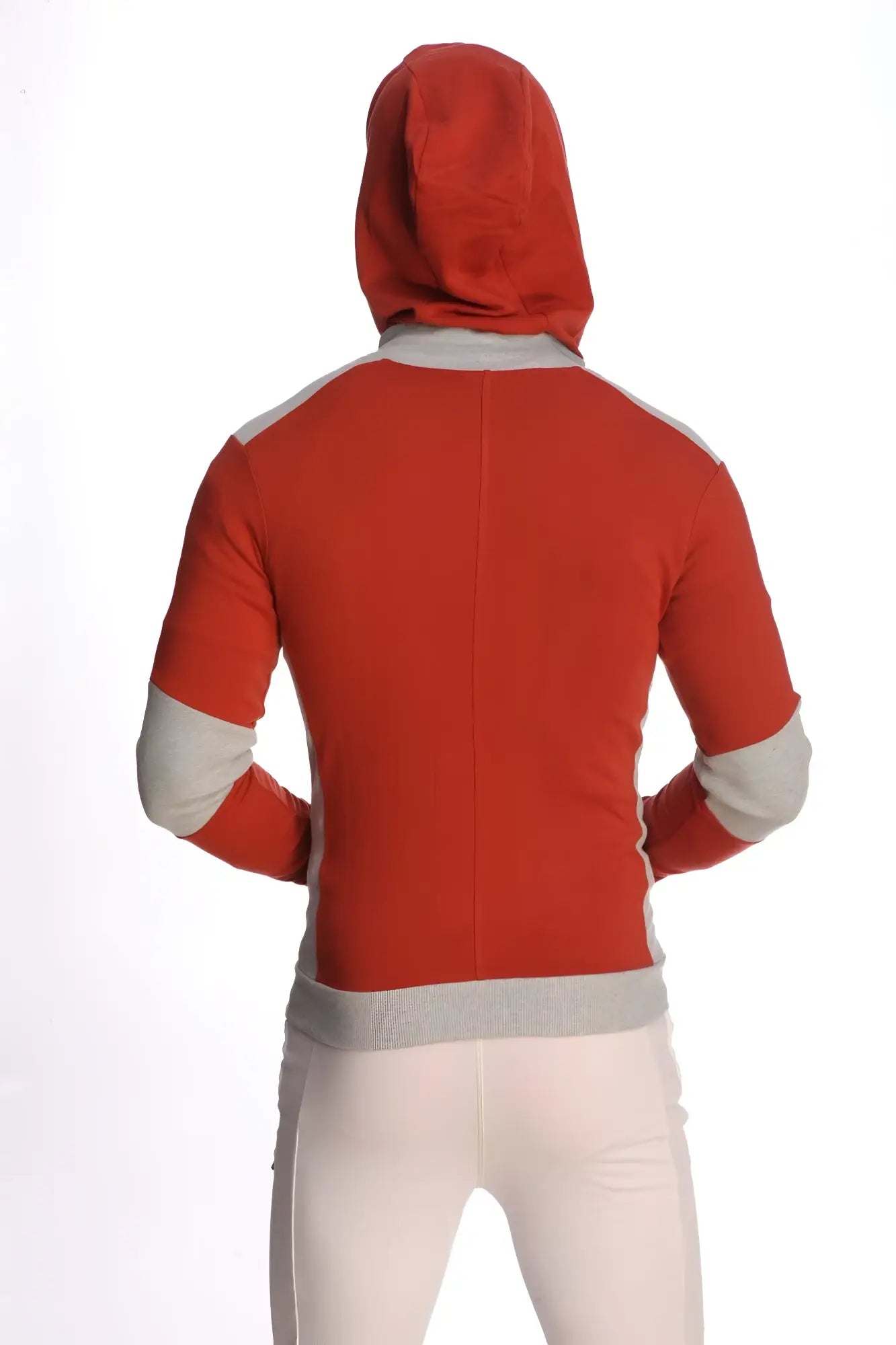 Form-fit crossover yoga track performance hoodie in cinnabar red with gray accents on shoulders sleeves and waistband