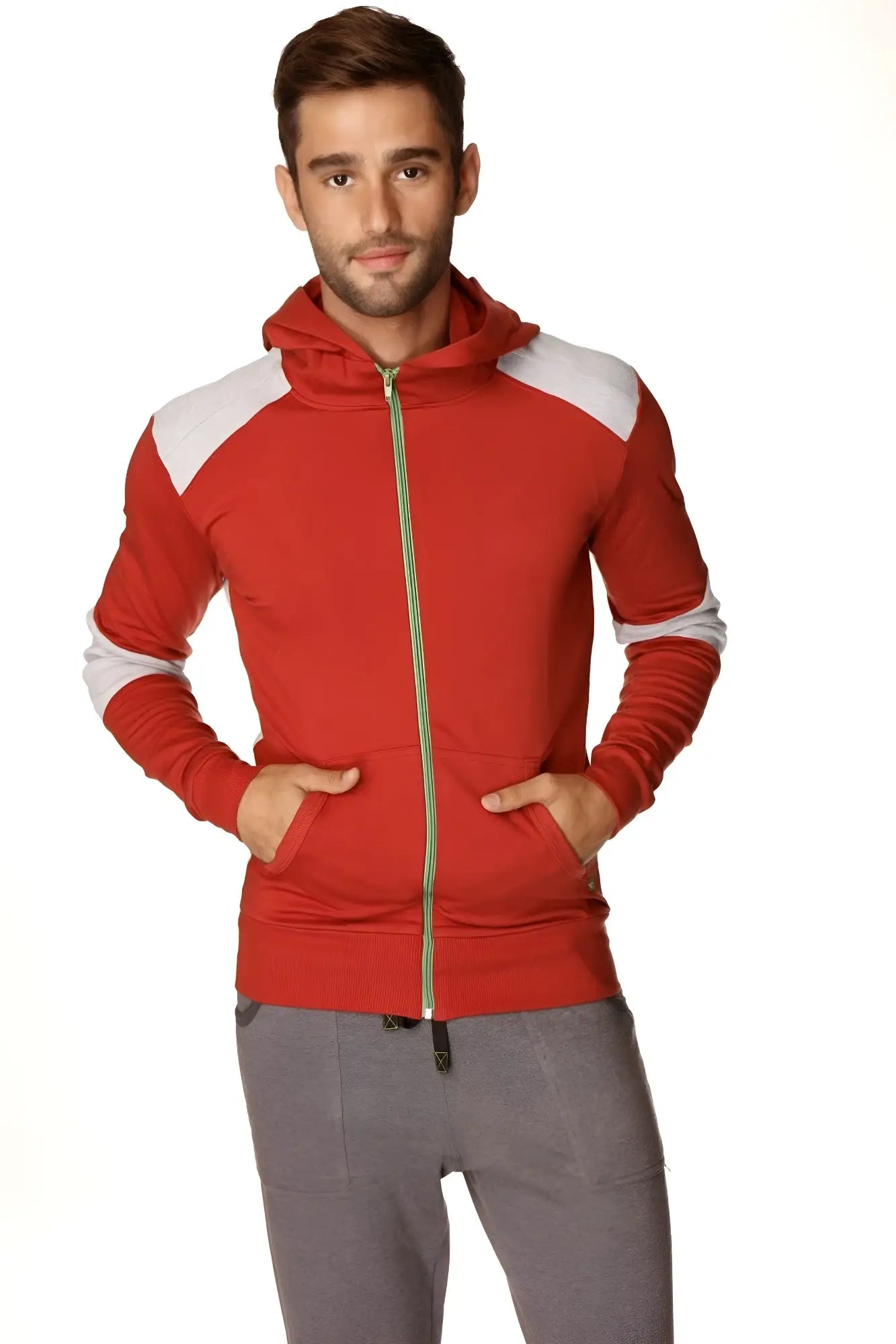 Form-fit crossover yoga track performance hoodie in cinnabar grey with red and white color block and gold zipper