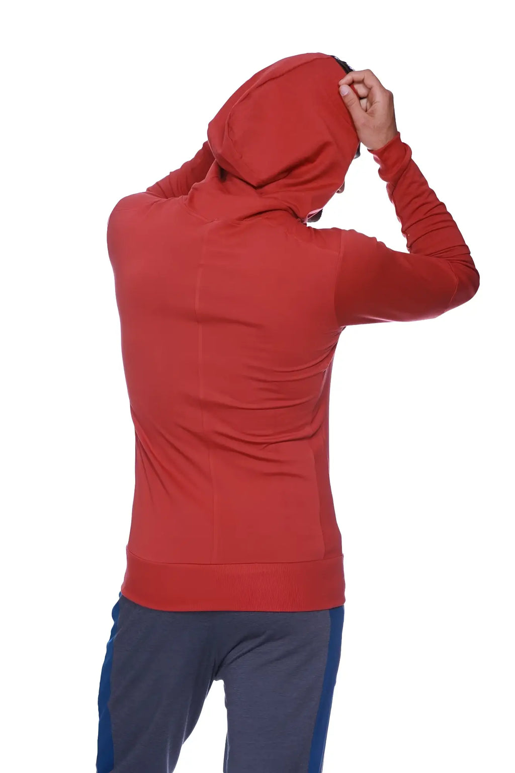 A vibrant red form-fit crossover yoga track performance hoodie with long sleeves and subtle seam detailing