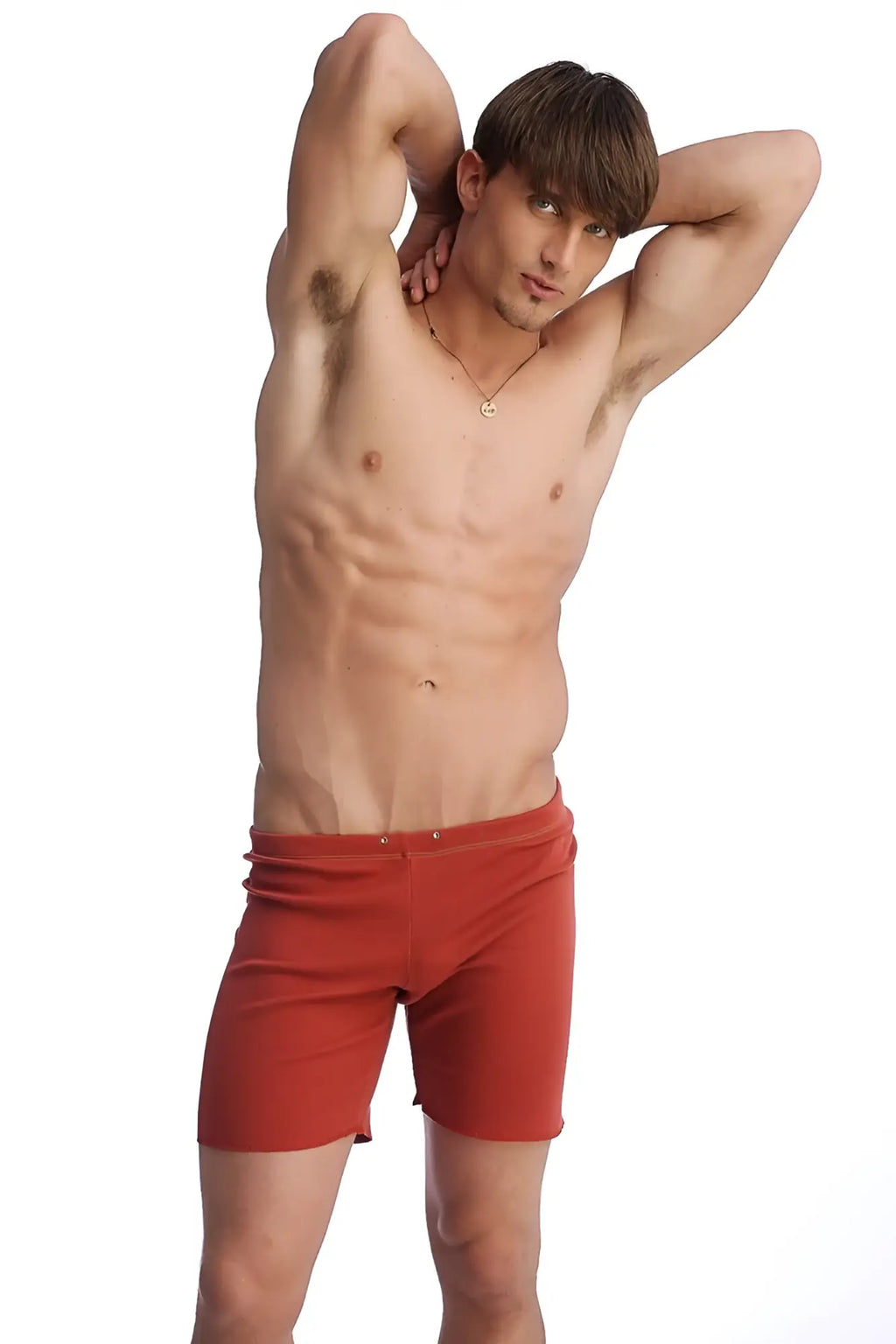 Fusion yoga short in cinnabar red featuring snug fit red athletic shorts with elastic waistband for activewear