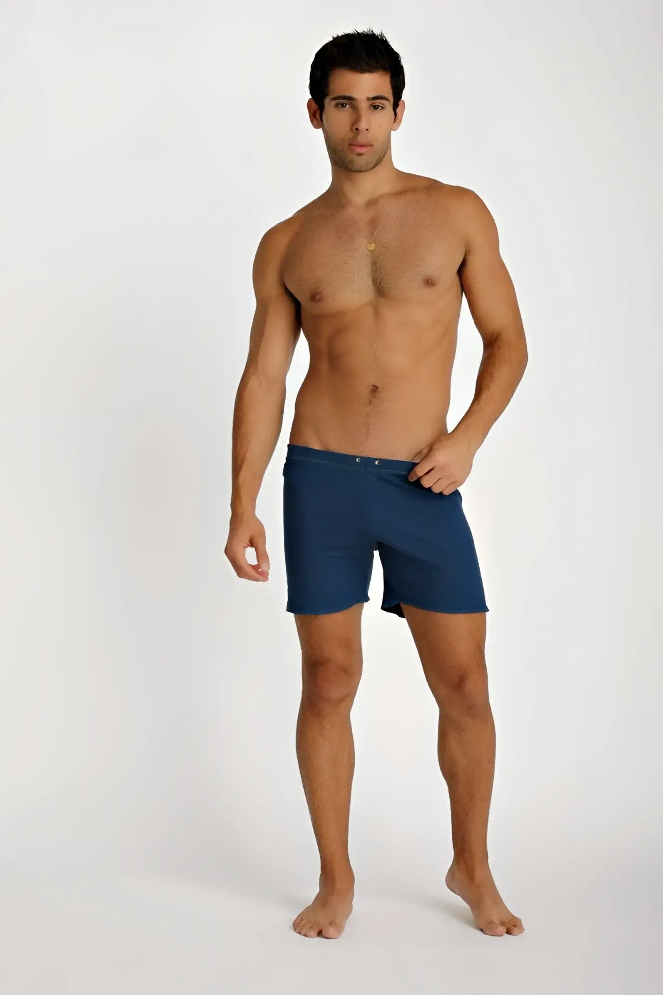 Navy blue fusion yoga shorts with a clean design and button closure at the waist for comfortable activewear