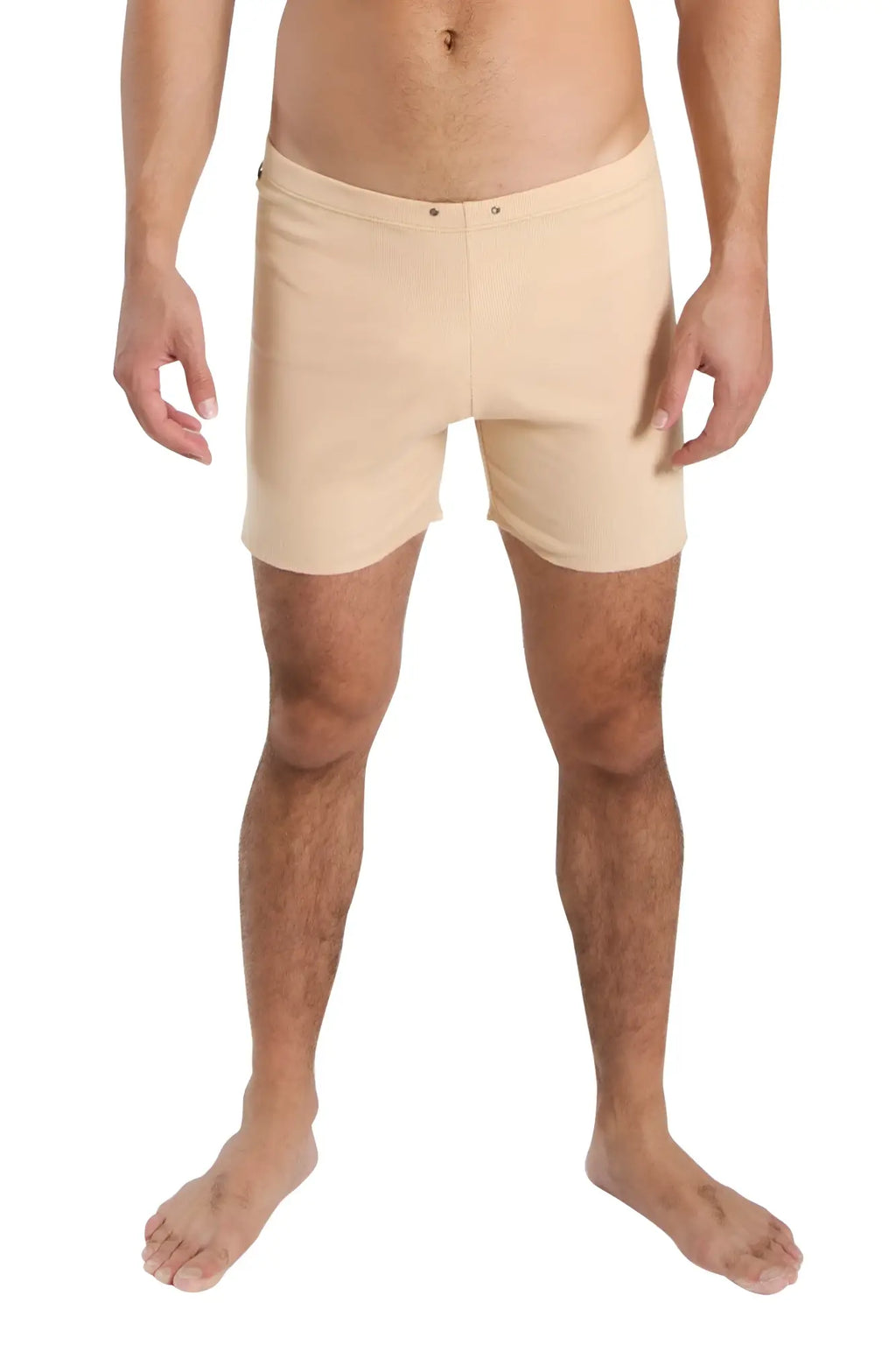 Beige fusion yoga short swim trunks with smooth fabric finish and subtle front seam detail