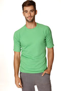A men’s short-sleeved hybrid crew neck raglan tee in bamboo green with ribbed texture and rolled-up sleeves