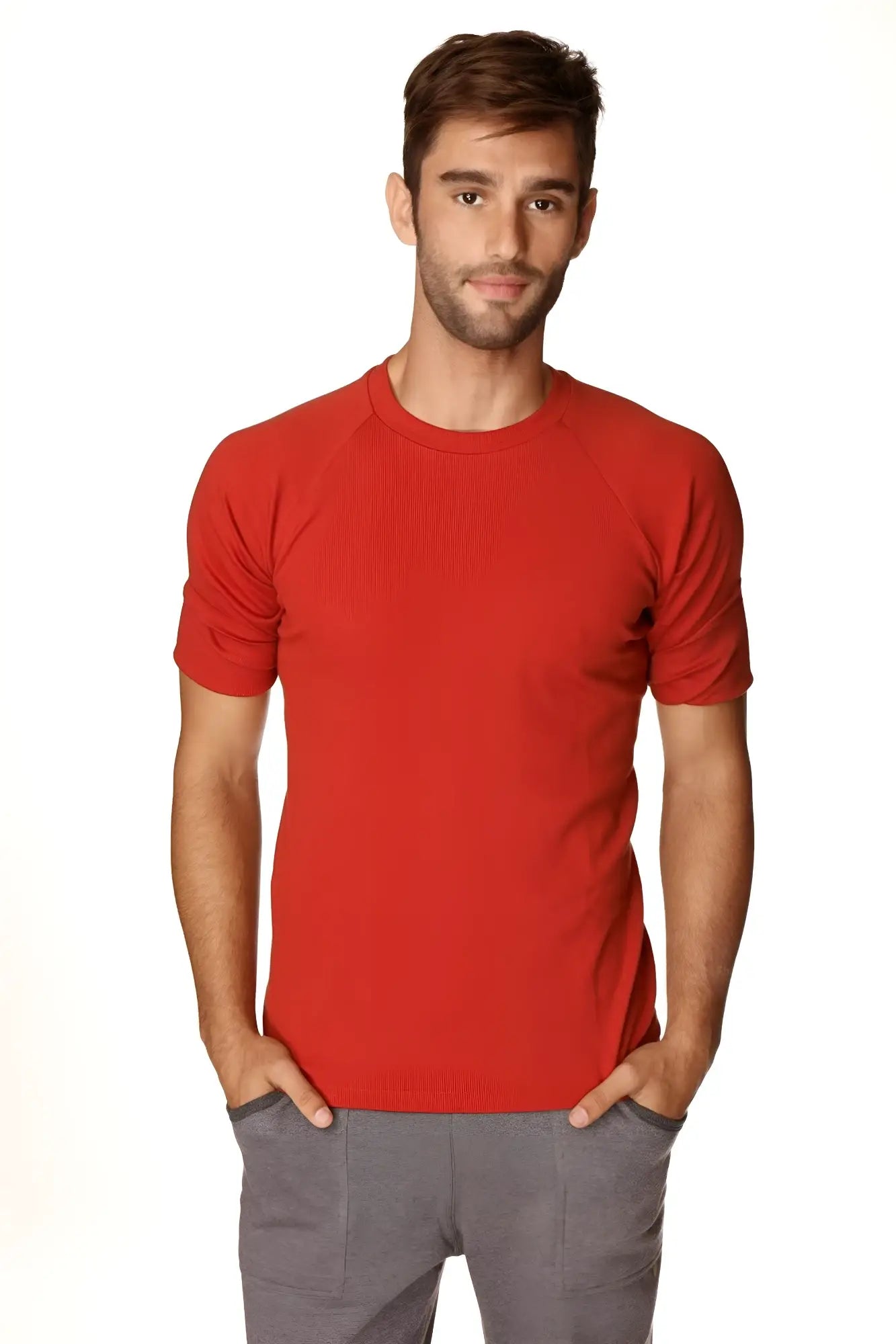 Red hybrid crew neck raglan tee with short sleeves and ribbed cuffs in cinnabar red for casual wear