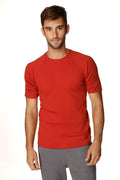 Red short-sleeved hybrid crew neck raglan tee in cinnabar red with comfortable breathable fabric for casual wear