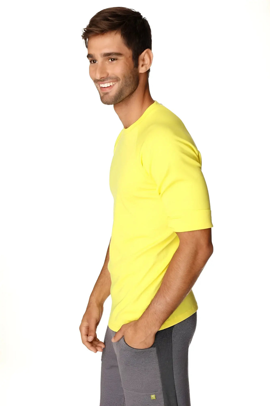 Bright yellow hybrid crew neck raglan tee with short sleeves and simple crew neck design perfect for casual wear