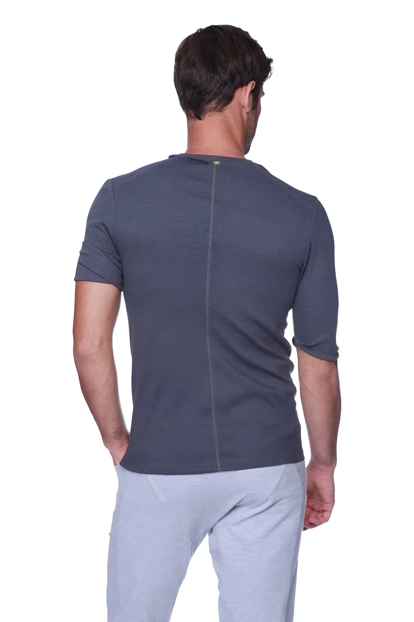 Dark gray textured hybrid v-neck short sleeve t-shirt with subtle vertical seam on the back in charcoal color