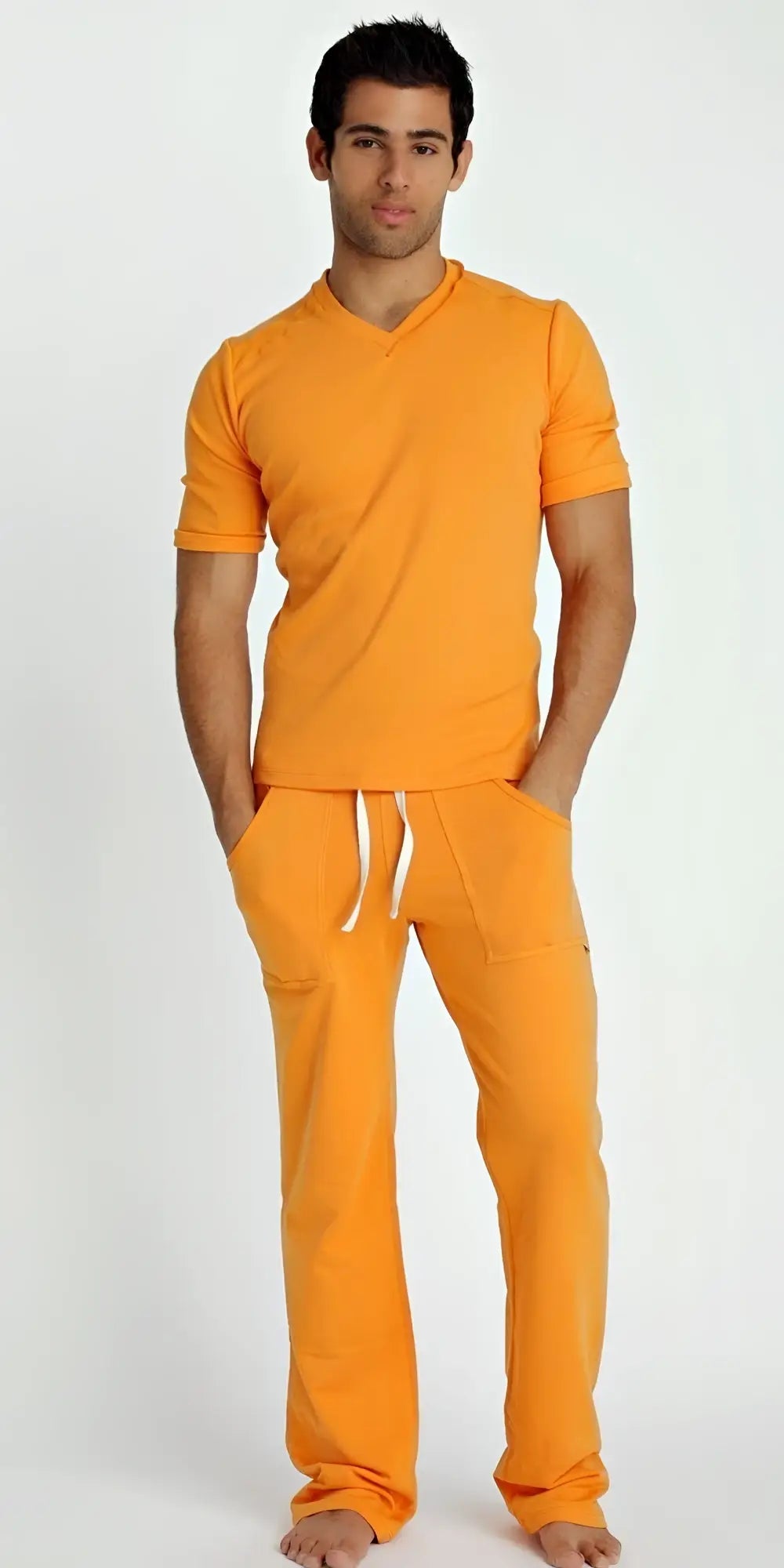Orange hybrid v-neck short-sleeved t-shirt with matching pants and white drawstrings in lightweight fabric