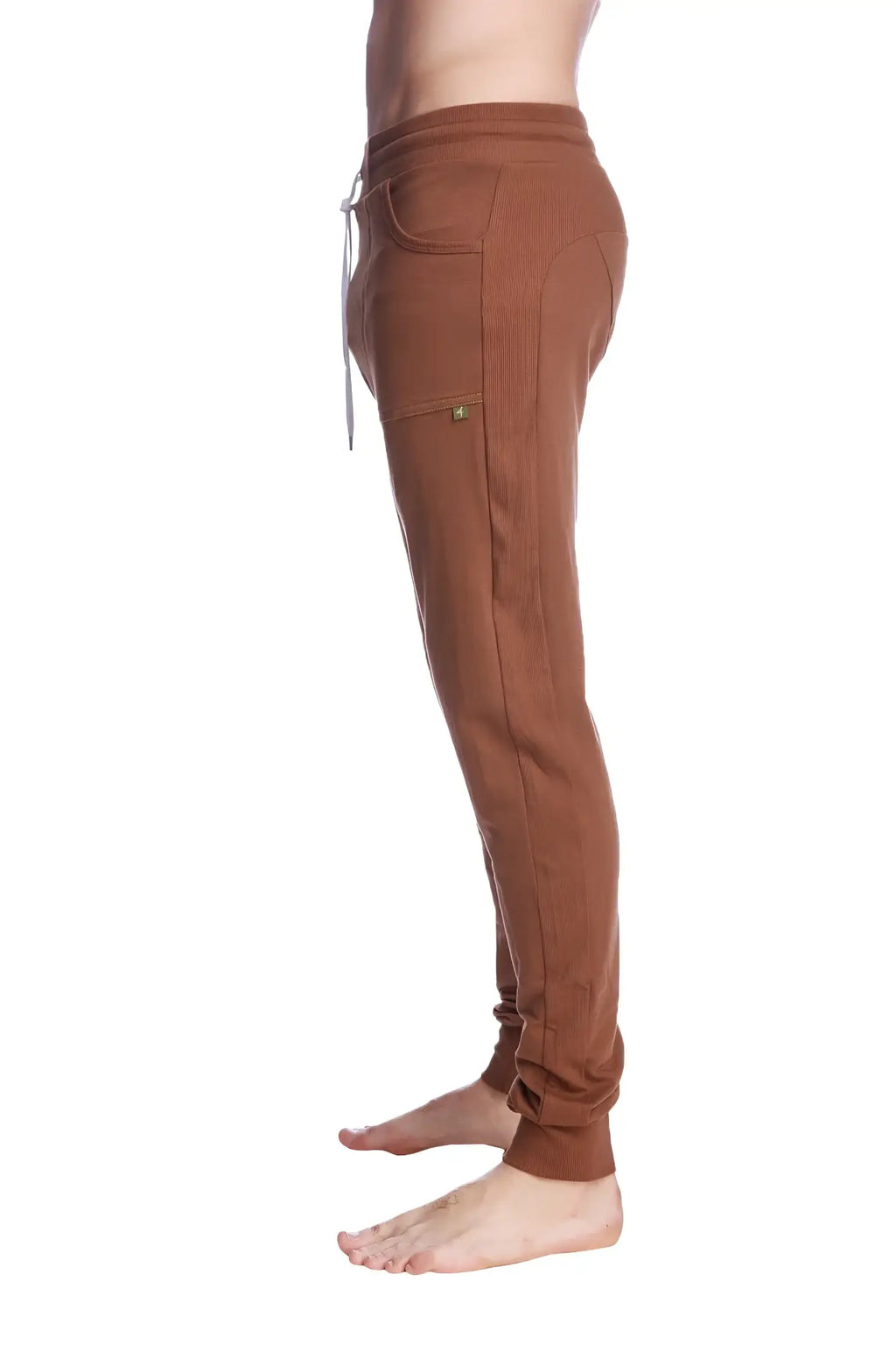 Long cuffed jogger and yoga sweat pants in chocolate brown with drawstring waistband and side pockets in soft fabric