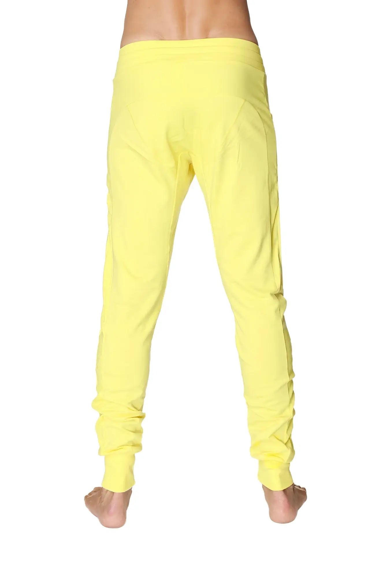 Bright yellow soft fabric long cuffed jogger and yoga sweat pants with relaxed fit and ruched cuffs