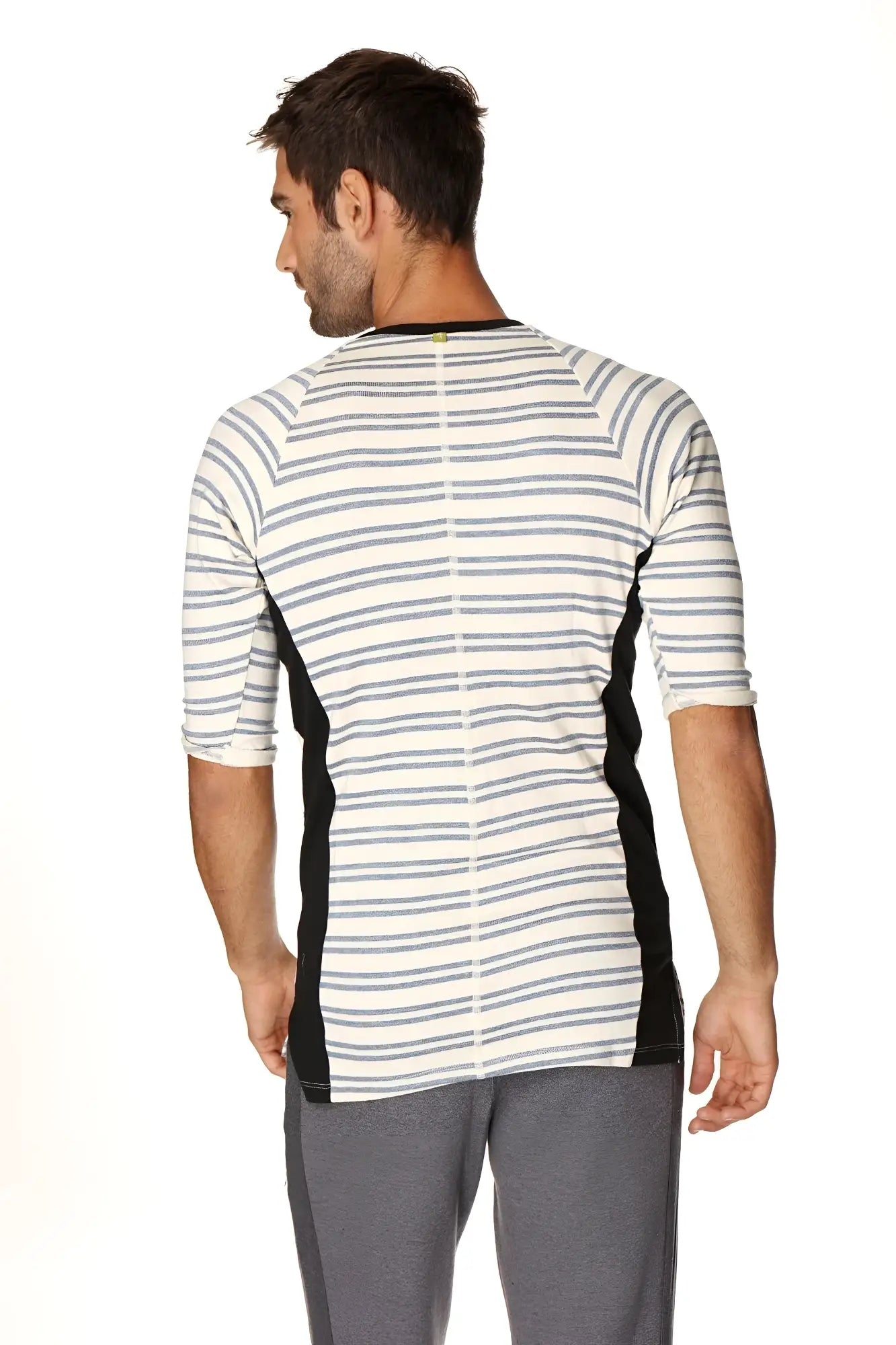 A men’s three-quarter sleeve vintage-stripe henley tee in french terry loop with white base gray stripes and black panels