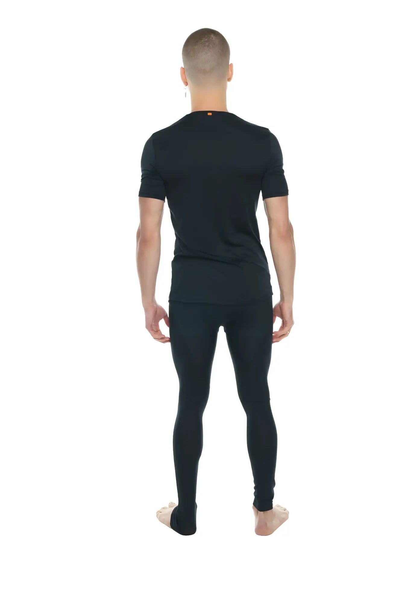 Black carbon perfect pocket crew neck tee paired with black seamless form fitting short sleeve and full length leggings set
