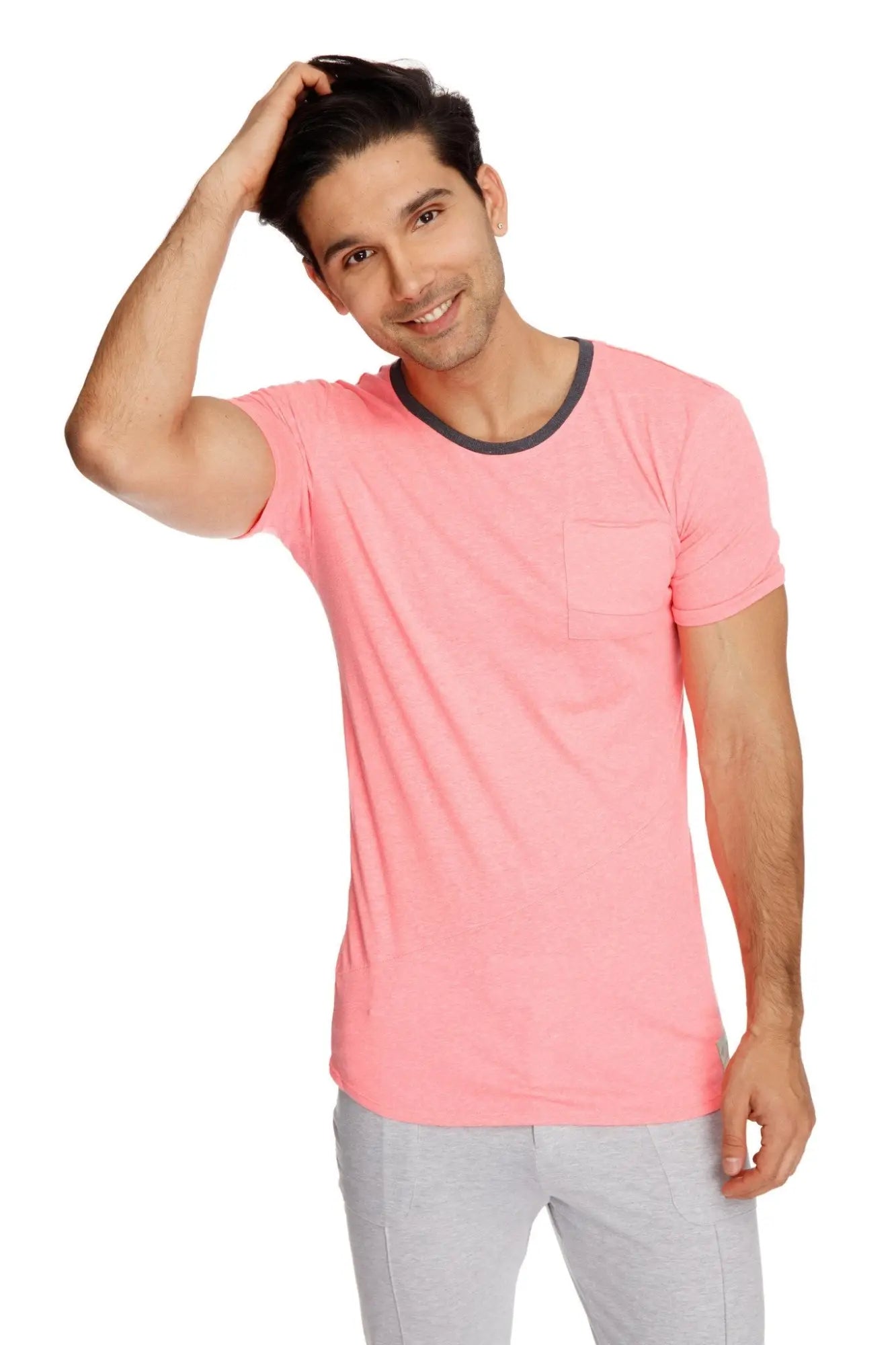 Coral slub perfect pocket crew neck tee is a pink short sleeve t shirt with a black ribbed neckline and chest pocket