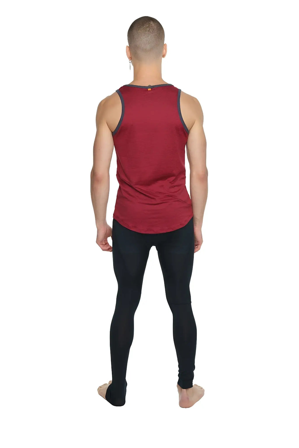 Red sleeveless tank top with dark gray trim along neckline and armholes in brick red perfect for casual wear