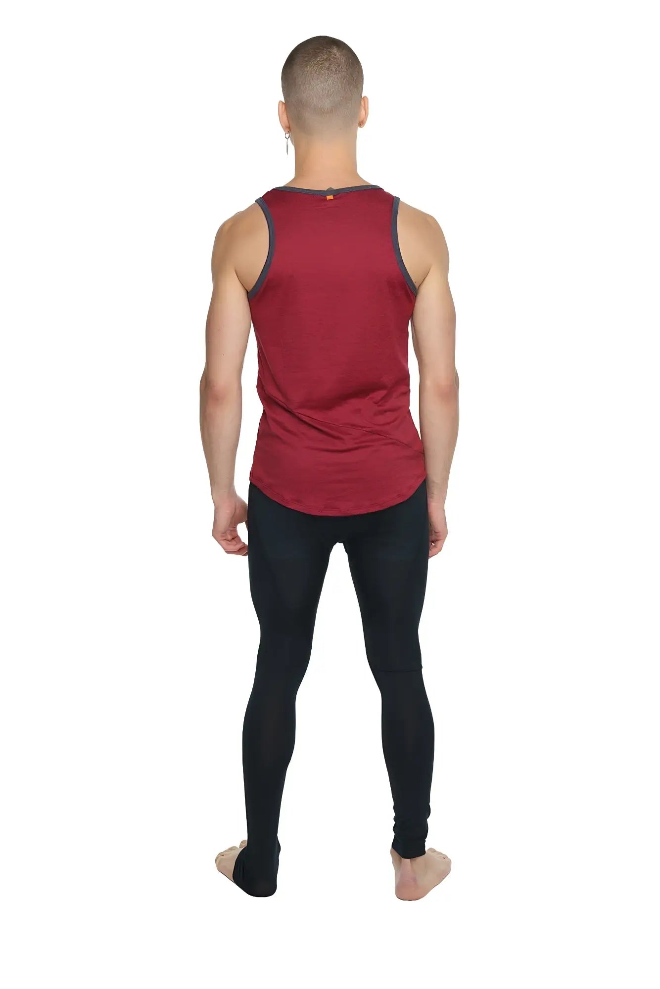 Red sleeveless tank top with dark gray trim along neckline and armholes in brick red perfect for casual wear