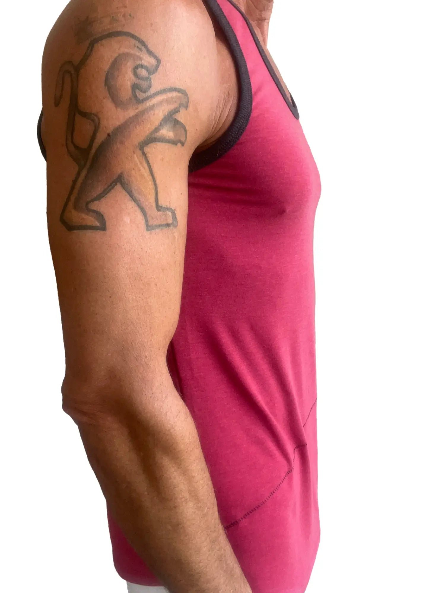 A vibrant raspberry pink tank top with black trim along the neckline and armholes called the perfect tank