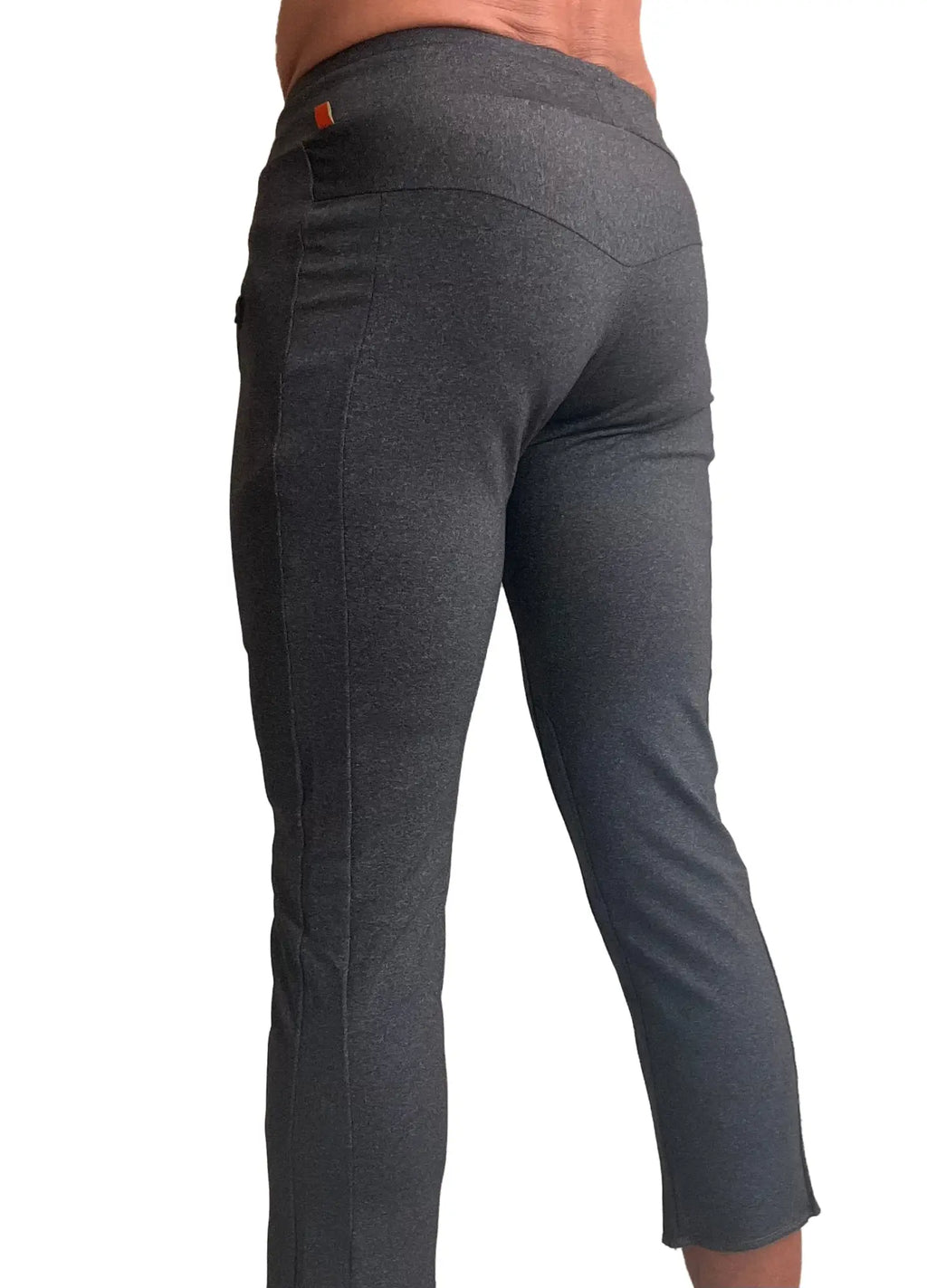 Performance premium mens charcoal heather snug fit fabric leggings with an orange brand tag at the waistband