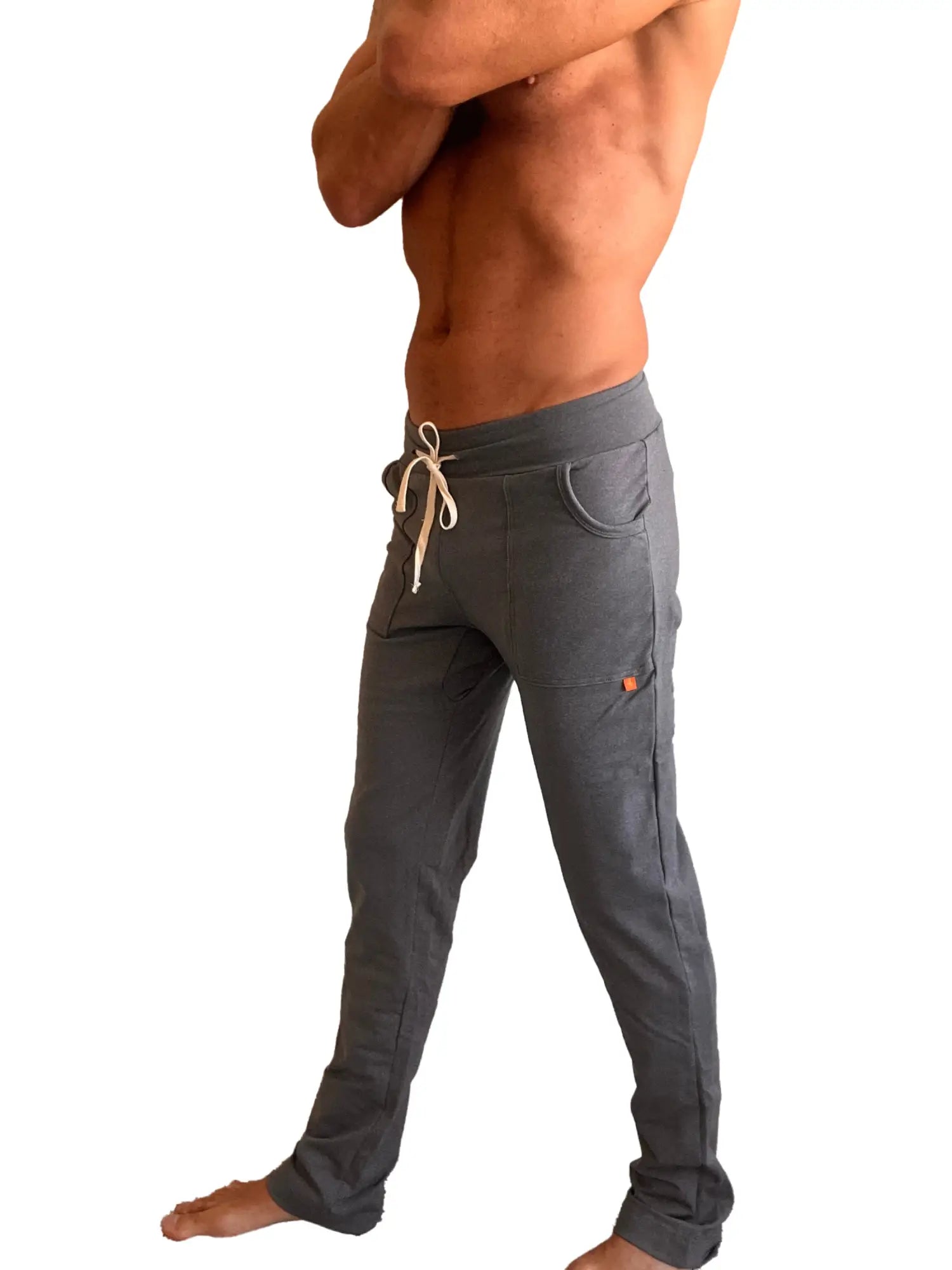 Performance premium track and lounge sweat pant in dark heather grey with drawstring waist side pockets and orange brand tag