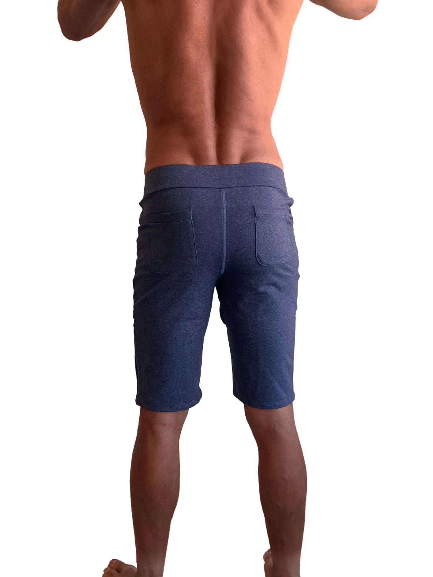 Back side of navy blue heather performance premium urban tactical dress shorts with elastic waistband and two pockets