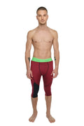 Performance yoga leggings 3/4 in brick red heather with maroon and black fabric and bright green waistband