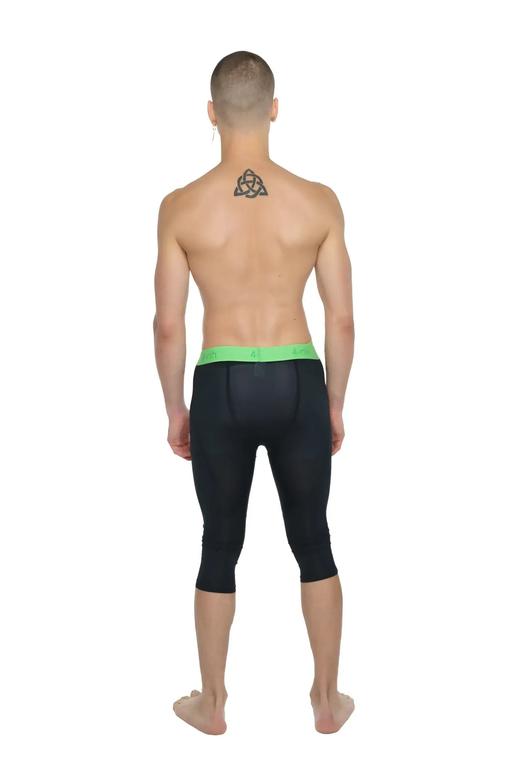 Black compression performance yoga leggings with bright green waistband 3/4 length in carbon black