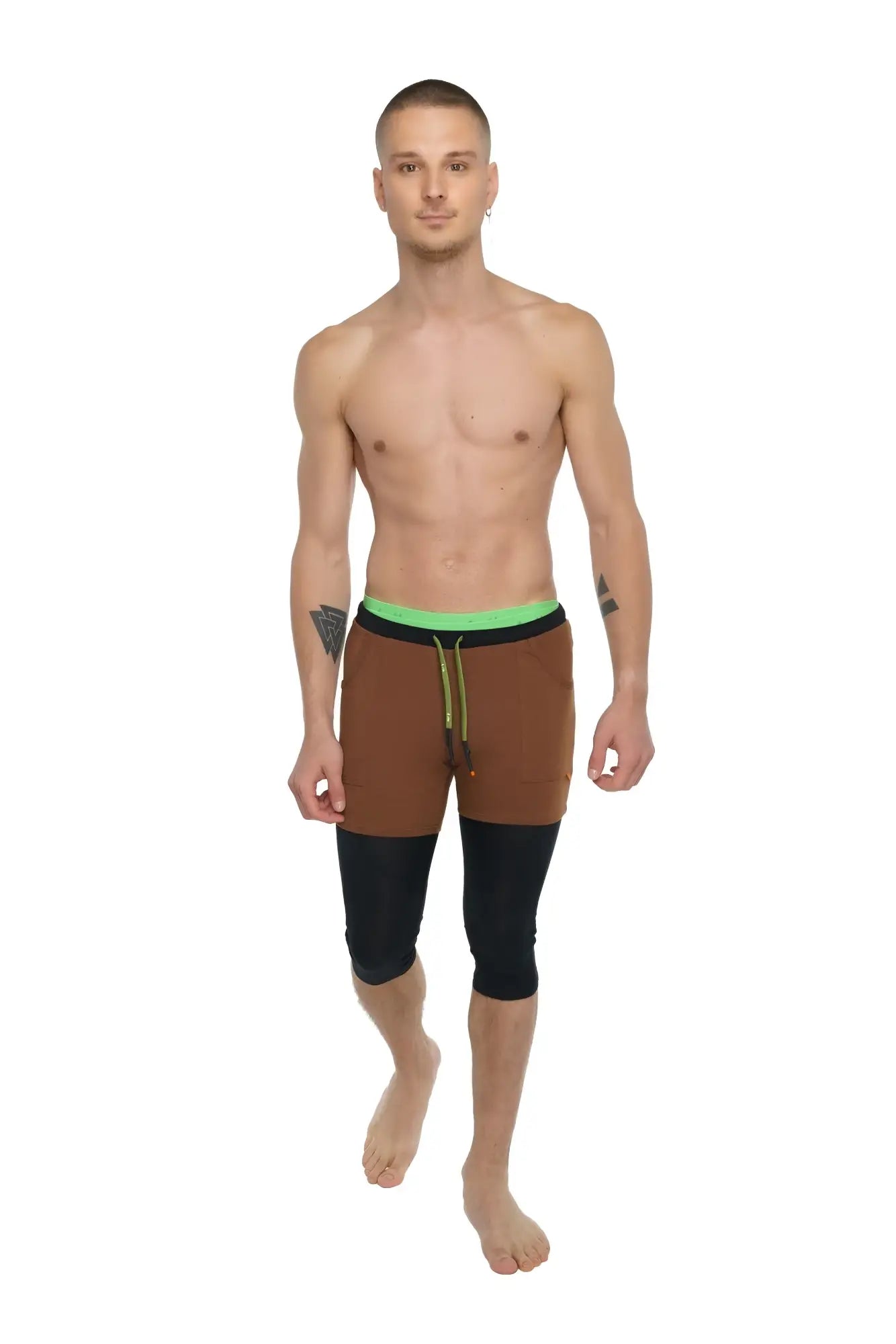 Performance yoga leggings 3/4 in carbon black with brown and black two-tone design and neon green waistband