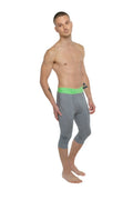 Performance yoga leggings 3/4 length in steel heather with a bright green waistband for flexible workouts