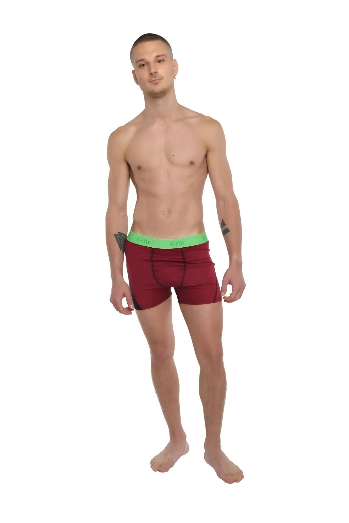 Performance yoga leggings short in brick red heather with a bright green waistband shown from the back