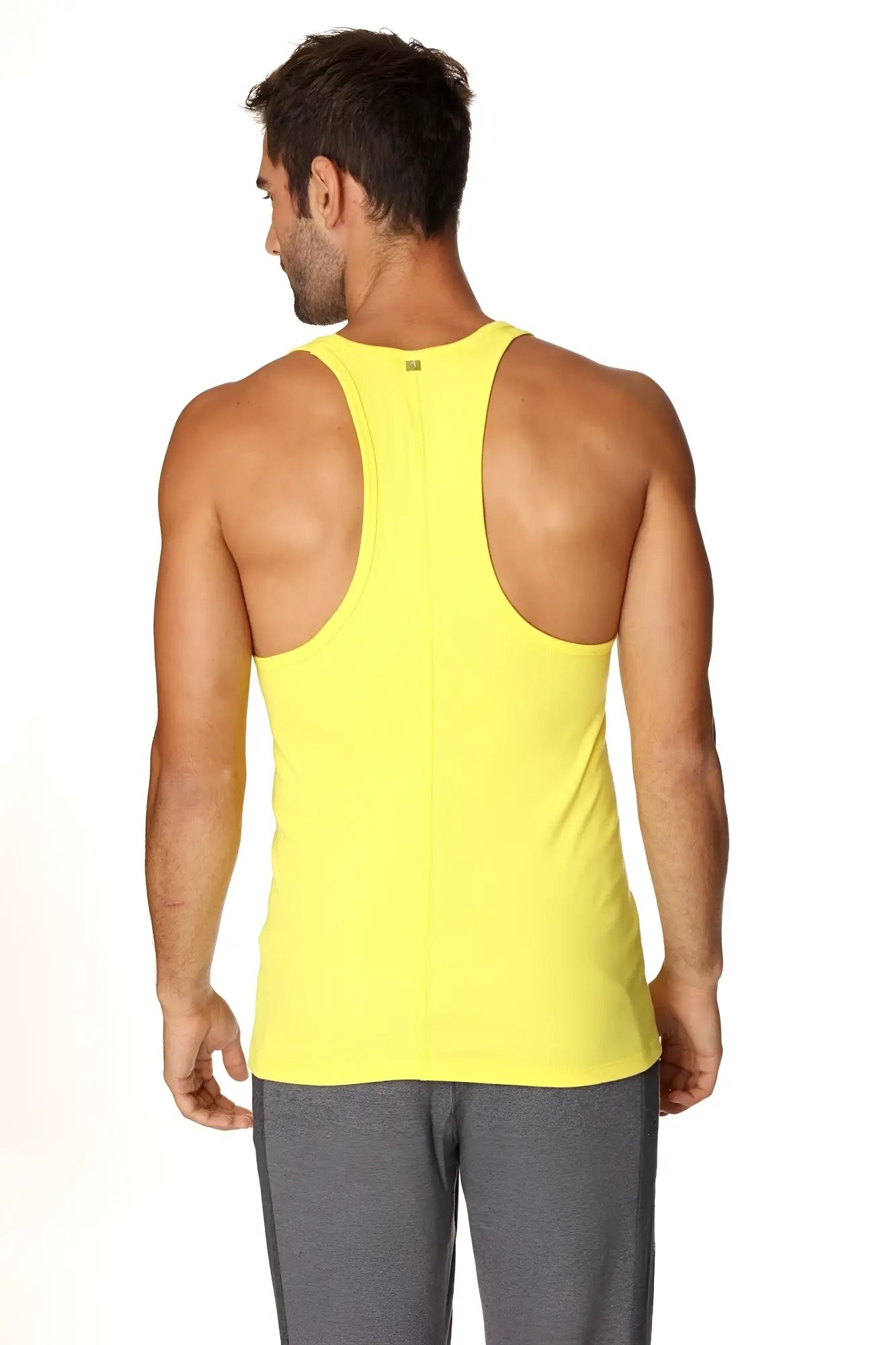 Bright yellow racerback yoga tank top with sleek form-fitting design for comfortable workout wear