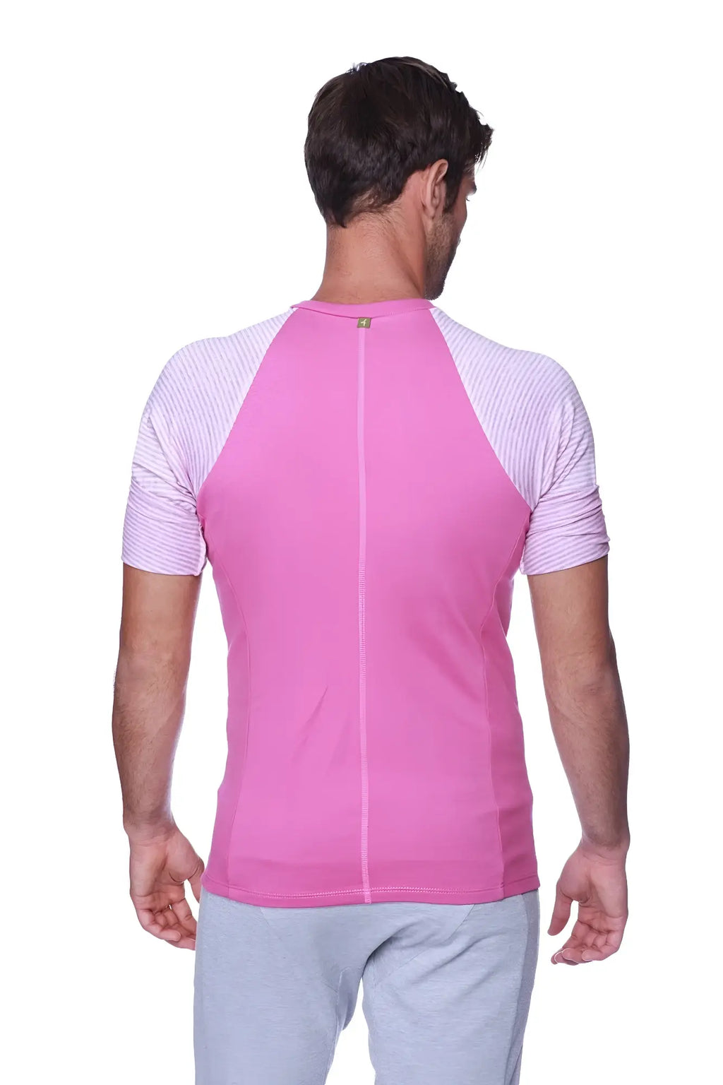 Pink athletic raglan sleeve crew neck shirt with light gray and white striped shoulders for activewear