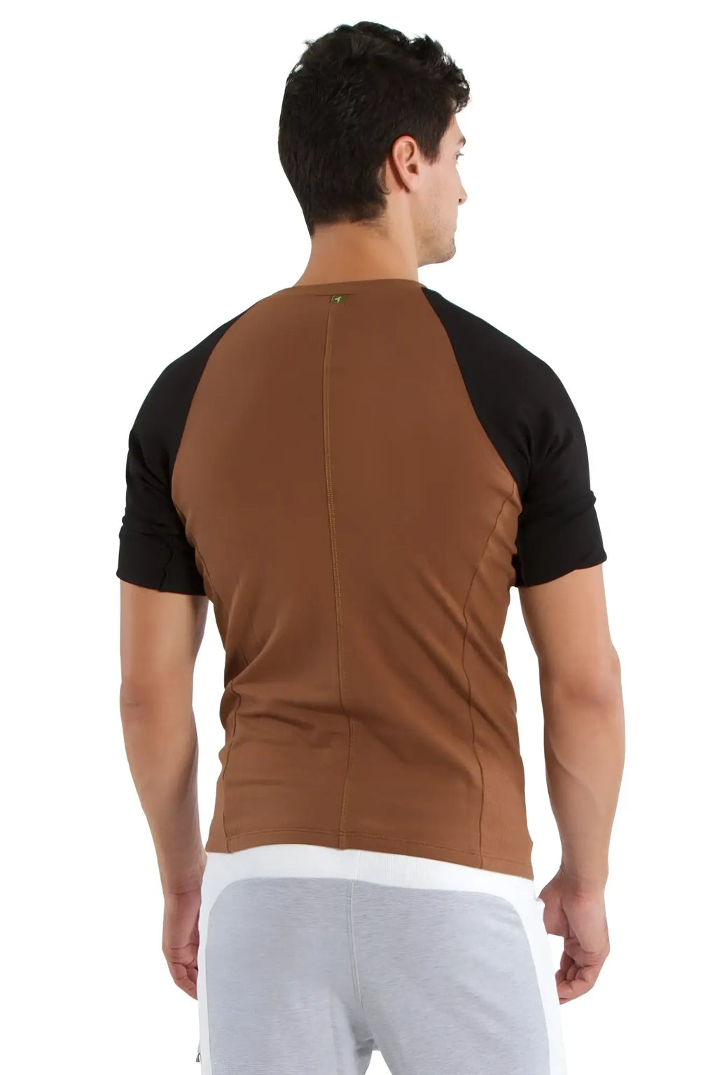 Back view of brown and black raglan sleeve athletic tee with fitted back design in chocolate w black color