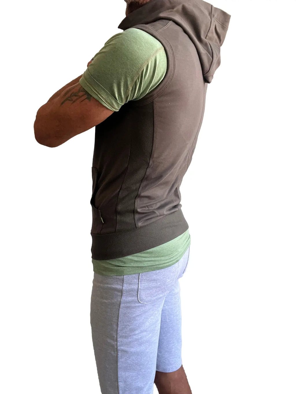 Brown hooded sleeveless vest with ribbed waistband and side pockets designed for yoga in army green color