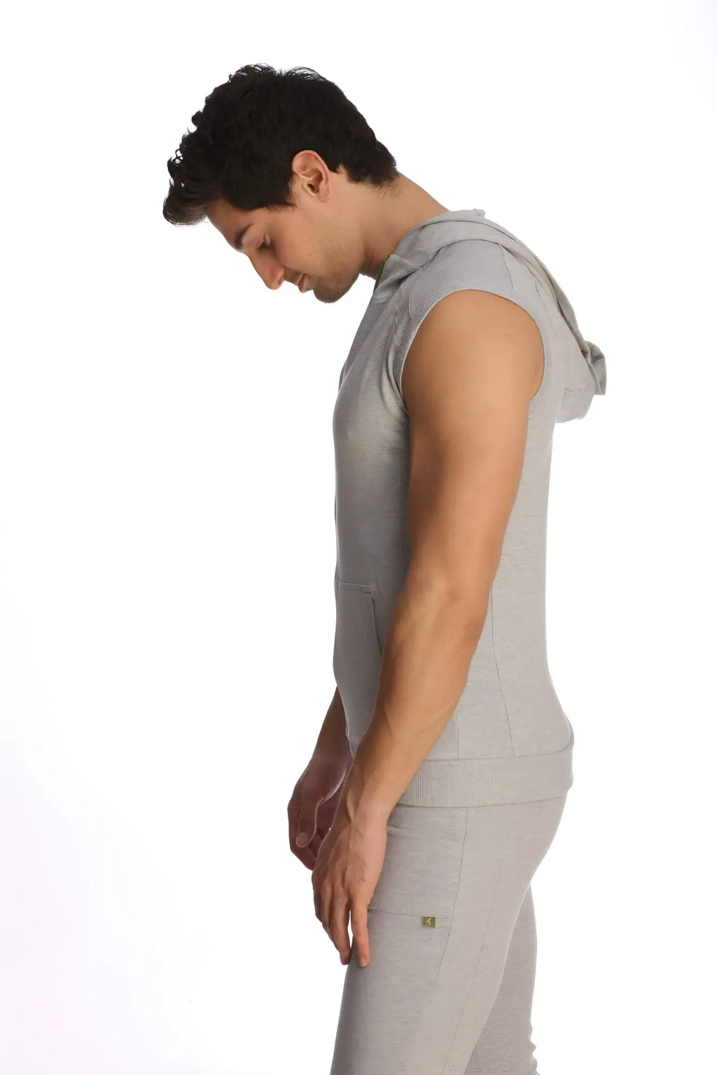Gray sleeveless yoga hoodie with hood and front pocket made of soft fabric for comfortable activewear use